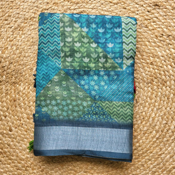 Vibrant Blue and Green Linen Saree with Abstract Motifs