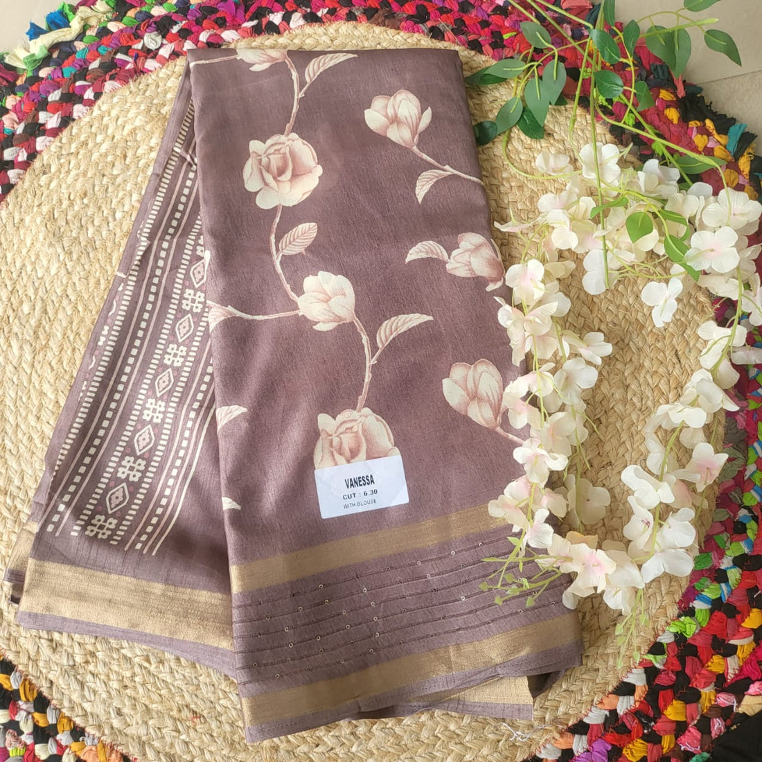 Elegant Mauve Silk Saree with Floral Motifs & Subtle Gold Border"