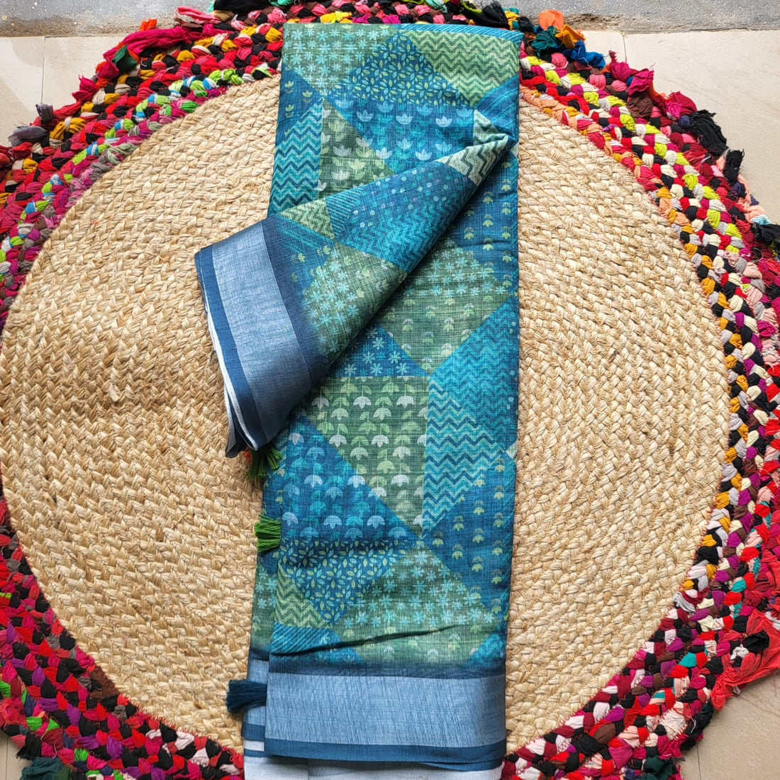 Vibrant Blue and Green Linen Saree with Abstract Motifs